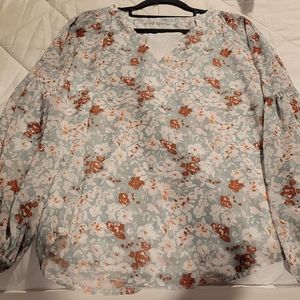 I got this from target. It's a small, light turquoise with white and maroon.